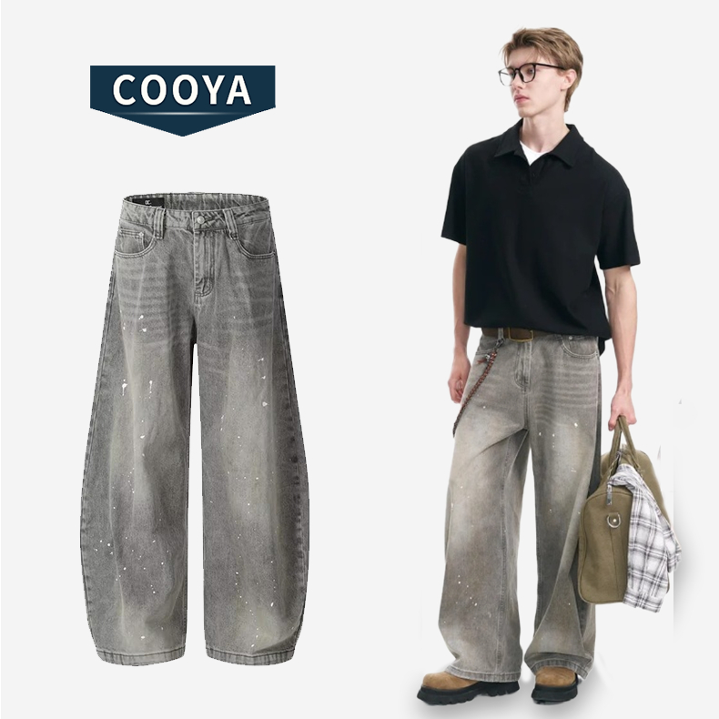 COOYA กางเกงยีนส์ scimitar ใหม่อเมริกันย้อนยุคหลวมสบายๆหมึกสาดสไตล์เป็นกลาง ทรงหลวมสบาย เนื้อผ้านุ่ม