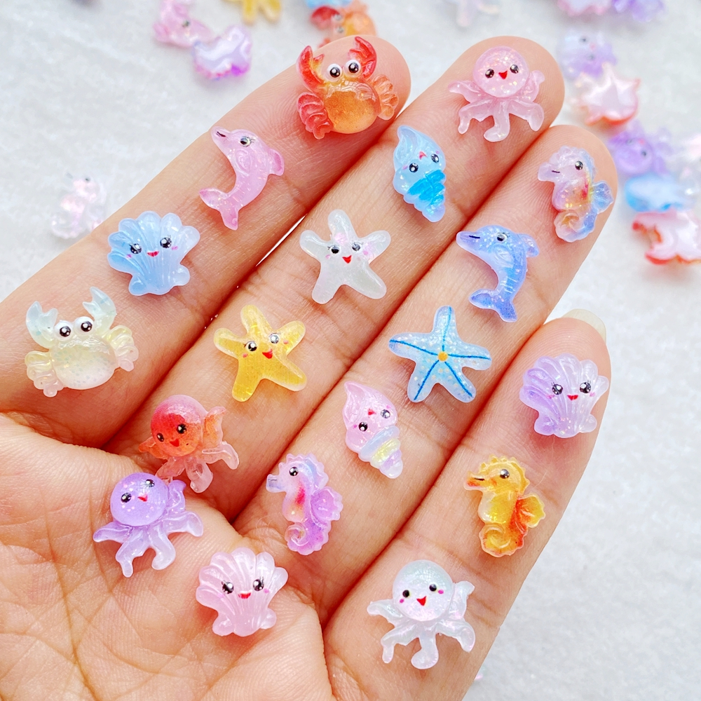 50ชิ้นน่ารักมินิการ์ตูนมหาสมุทรชุดปลาโลมา,ปลาหมึก,ปู,ปลาดาว,เปลือกเล็บศิลปะเรซิ่นออกแบบเสน่ห์ ทําเอง หัตถกรรมเล็บ3ง ตกแต่ง
