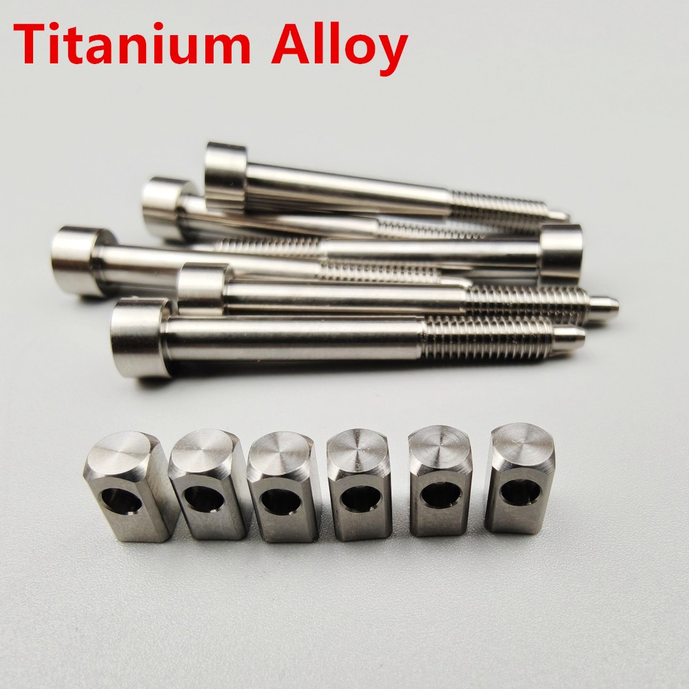 1 ชุดไทเทเนียมอัลลอยด์ String ล็อคสกรูและอานใส่บล็อก Fit สําหรับ Floyd Rose Tremolo กีตาร์ไฟฟ้าอุปกรณ์เสริม