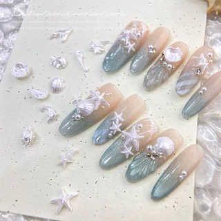 Rou Bao 50 ชิ้นเล็บ Ocean Series ปลาดาว Conch Seahorse มะพร้าวต้นไม้เรซิ่นเล็บ Art DIY Charms ตกแต่ง