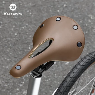 WEST BIKING เบาะรองนั่งแบบกันลื่นสไตล์เรโทรสำหรับจักรยานเสือหมอบ Brompton Bike เบาะนั่งจักรยานกลวงระบายอากาศดูดซับแรงกระแทกได้อย่างสบาย อุปกรณ์เสริมจักรยาน