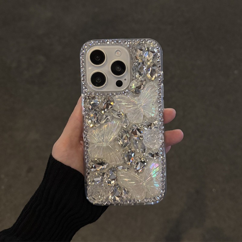 Bling Silver เลเซอร์ผีเสื้อดอกไม้เคสโทรศัพท์สําหรับ iPhone 17 11 12 13 14 15 16 Pro Max 16E 7 8 Plus XR X XS Max Glitter Rhinestone เพชรอะคริลิคกันกระแทก
