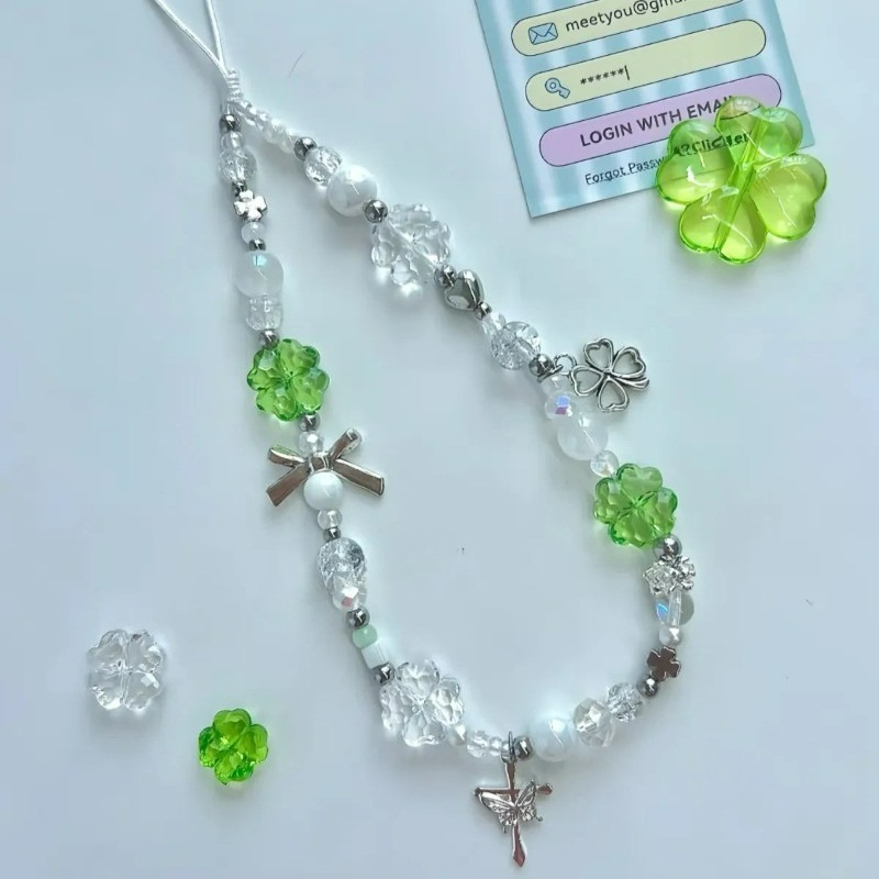INS โทรศัพท์ Charm ฤดูร้อนสด Four-Leaf Clover ลูกปัดสายโทรศัพท์กล้อง CCD กระเป๋าโซ่ข้อมือเชือกจี้