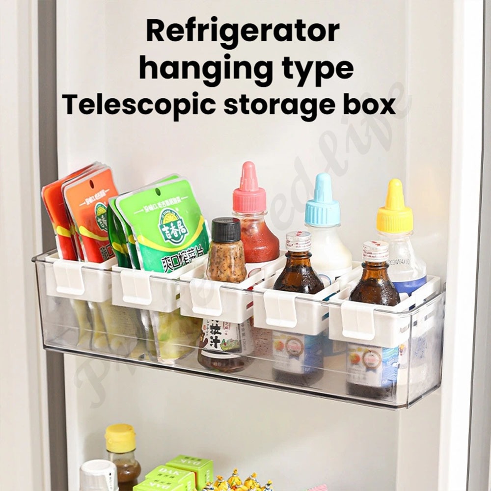 กล่องแขวนแบบยืดหดได้ขนาดเล็กสำหรับตู้เย็น ปรับได้อย่างอิสระ ติดบนประตูข้างตู้เย็น ถุงซอสสำหรับเก็บขนมขบเคี้ยวขนาดเล็ก ตะกร้าแขวนขนาดเล็ก