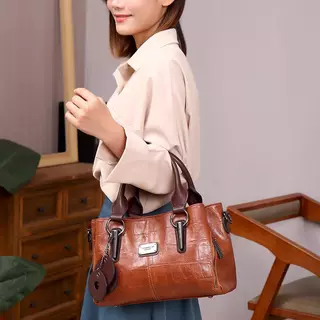 XIDIBAOLUO กระเป๋าหนัง ย้อนยุคและสง่างาม ทันสมัย คุณภาพสูง ความจุมาก มัลติฟังก์ชั่น กระเป๋าสะพายไหล่ กระเป๋าถือแบบพกพา มาใหม่ในปี 2025