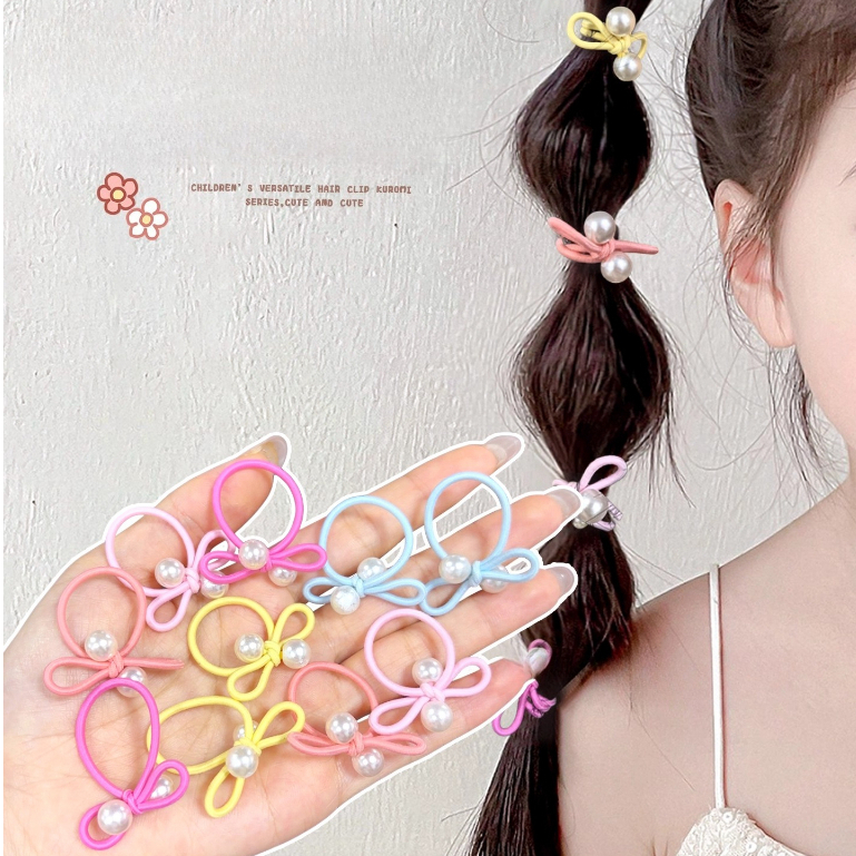 อุปกรณ์เสริมความงามสำหรับเด็ก: โบว์ยาง, มุก, และแหวนนิ้ว