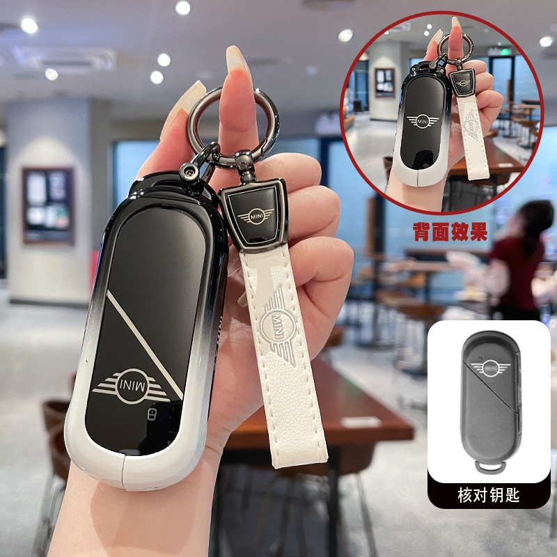 เคสกุญแจ MINI COOPER EV 2024 Electric Alcantara พวงกุญแจรถยนต์ กันรอย กันน้ำ วัสดุ โลหะผสมสังกะสีสําหรับ  พรีเมี่ยม เคสซิลิโคนรถยนต์ ปลอกหุ้ม  Countryman Convertible Aceman