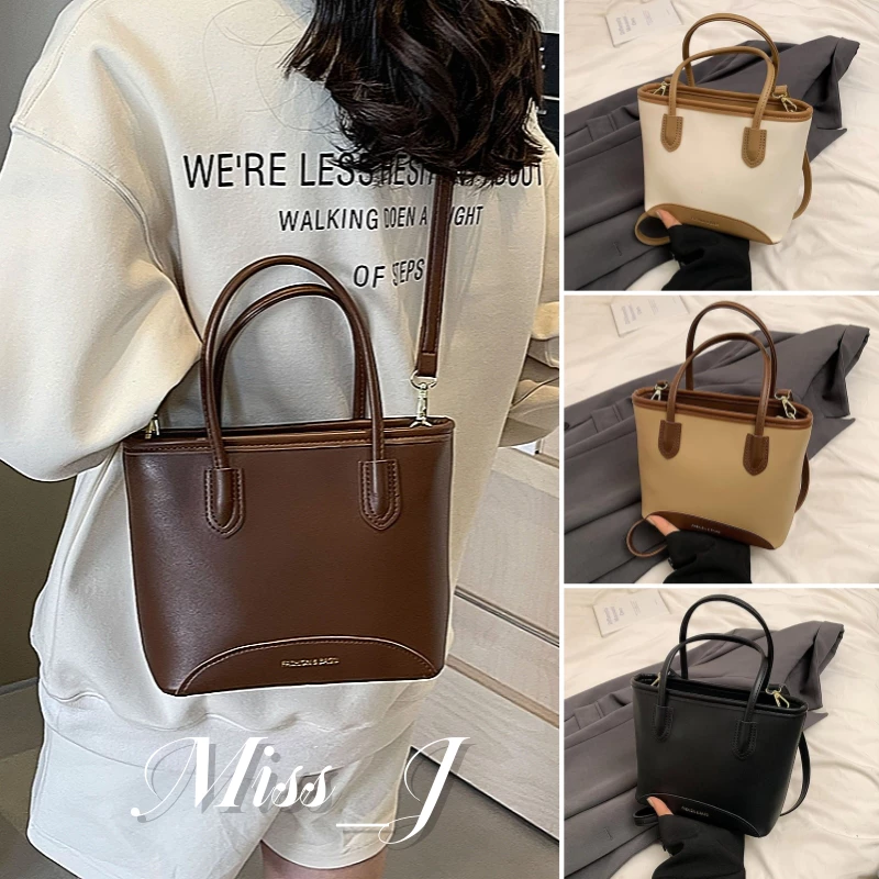 Miss_J พร้อมส่งจากกทม🎀กระเป๋าถือไฮเอนด์สไตล์ Niche Forest กระเป๋าสะพายไหล่สีตัดกัน กระเป๋าสะพายข้างเรียบง่ายและอเนกประสงค์