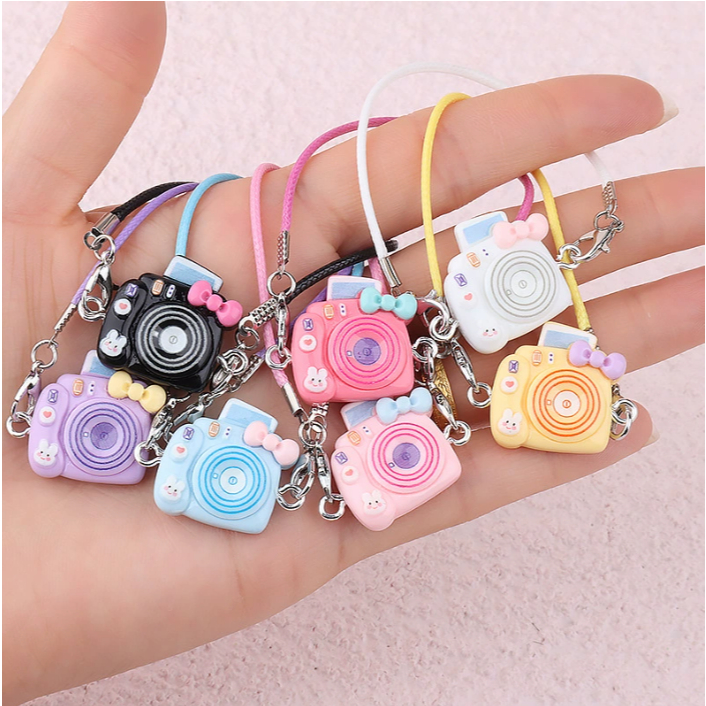 เครื่องประดับมินิ ลาบู ผ้าม, ขวดน้ํา, ถังป๊อปคอร์น, กล้อง, โทรศัพท์มือถือ
