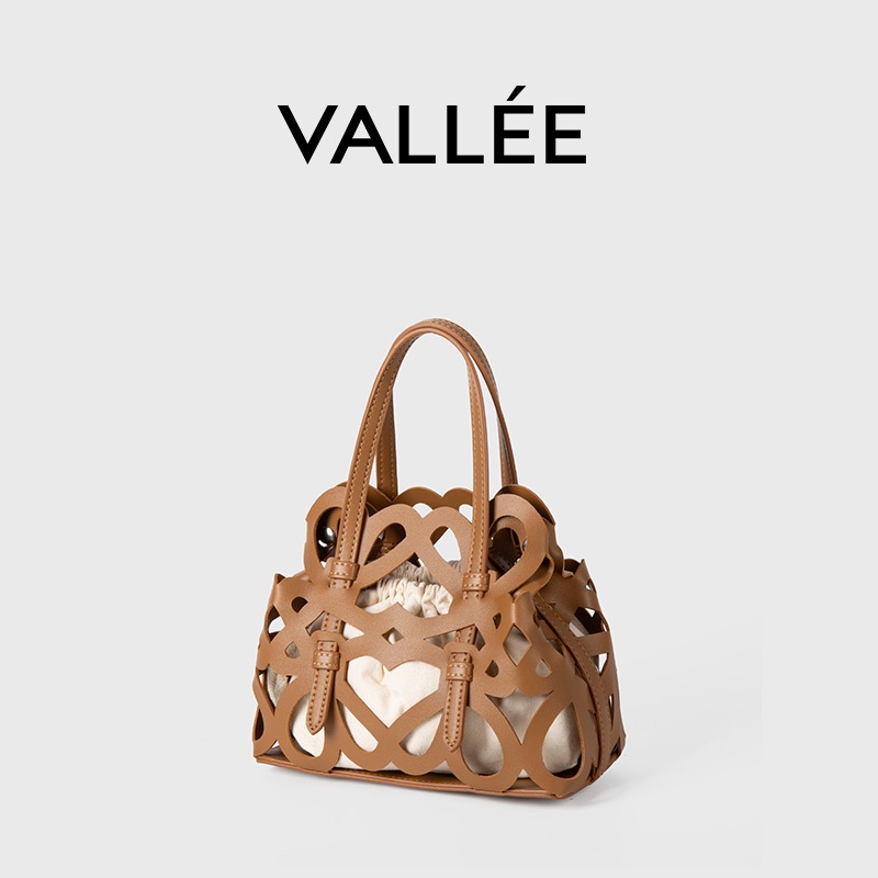 [VALLEE]✨พร้อมส่ง กระเป๋าหญิง✨สไตล์เกาหลีรูปแบบใหม่กระเป๋ากลวงกระเป๋าถือความจุขนาดใหญ่ เชือกรูด กระเป๋าสะพายข้าง กระเป๋าถังสะพายไหล่