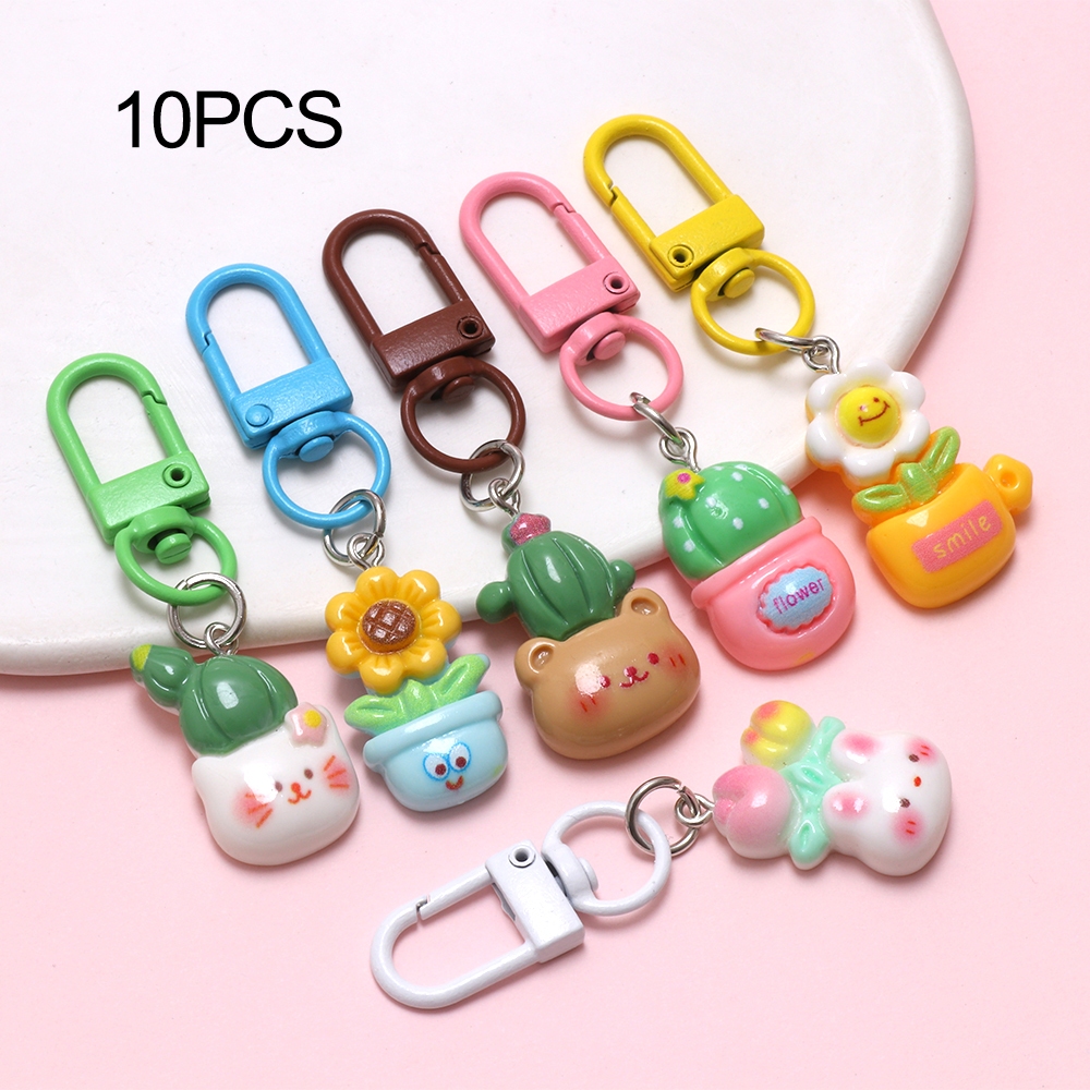 10ชิ้นสุ่มดอกไม้กระถางต้นไม้เรซิ่นพวงกุญแจเครื่องประดับเด็กนักเรียนของขวัญโทรศัพท์จี้เสน่ห์ - รูปที่ 6