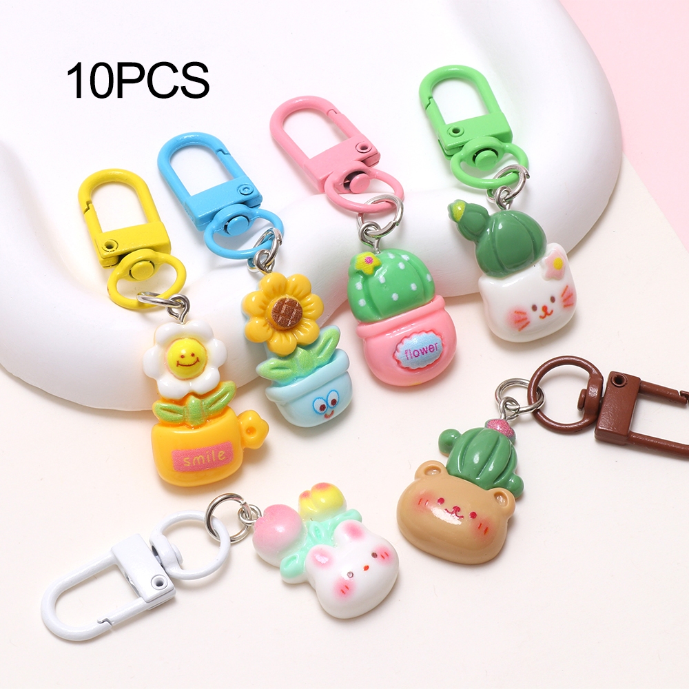 10ชิ้นสุ่มดอกไม้กระถางต้นไม้เรซิ่นพวงกุญแจเครื่องประดับเด็กนักเรียนของขวัญโทรศัพท์จี้เสน่ห์ - รูปที่ 4