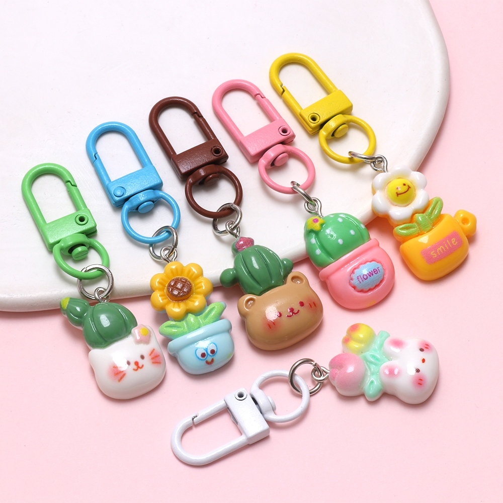 10ชิ้นสุ่มดอกไม้กระถางต้นไม้เรซิ่นพวงกุญแจเครื่องประดับเด็กนักเรียนของขวัญโทรศัพท์จี้เสน่ห์ - รูปที่ 5