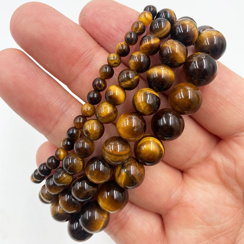 สร้อยข้อมือคริสตัลธรรมชาติสีเหลือง tiger's eye พร้อมลูกปัดขนาด 4-10 มิลลิเมตร เหมาะสำหรับทั้งผู้ชายและผู้หญิง เป็นของขวัญที่สวยงาม