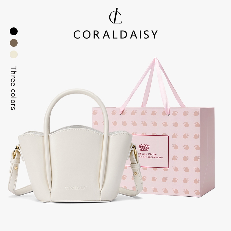 CORALDAISY ใหม่ปี 2025 กระเป๋าสะพายข้างผู้หญิงสุดหรู กระเป๋าโท้ทสีพื้น กระเป๋าสะพายไหล่สายยาว