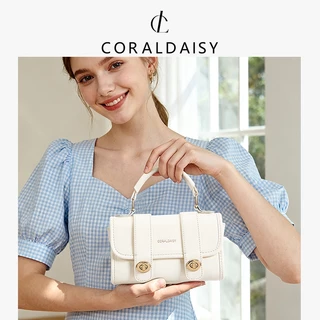 CORALDAISY กระเป๋าผู้หญิง 2025 หรูหรา กระเป๋าสะพายข้างสีพื้น ตัวล็อคแบบหมุน กระเป๋าสะพายไหล่สายยาว