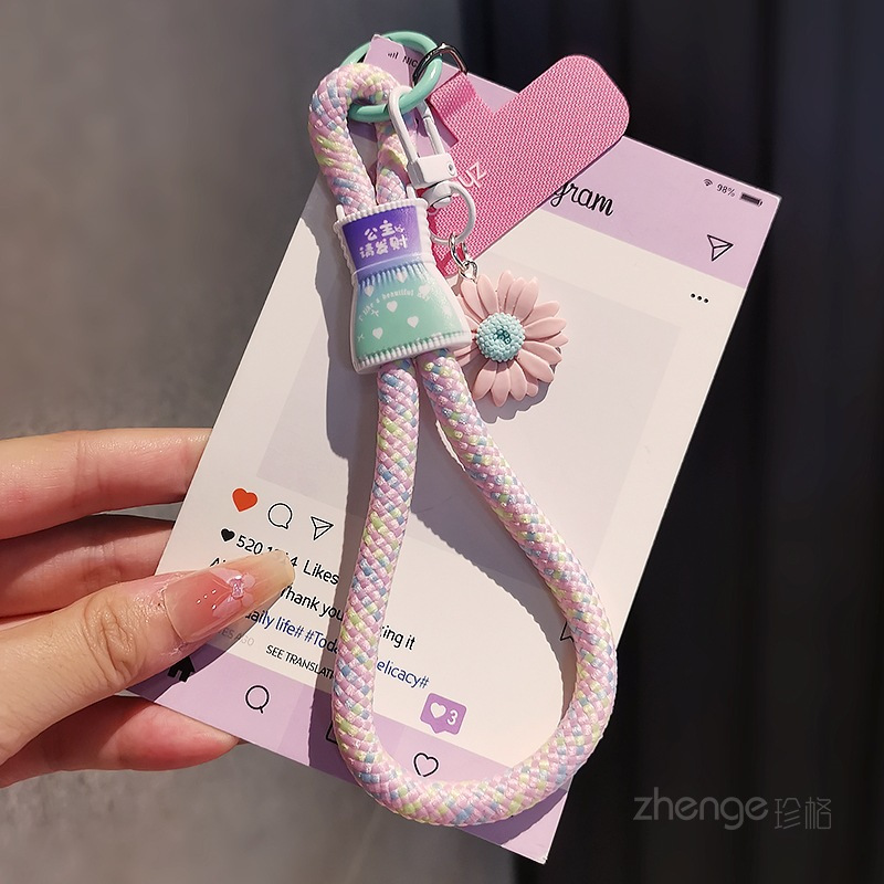 สายคล้องข้อมือเชือกเส้นเล็กโทรศัพท์แบบสั้นสไตล์เกาหลีพร้อมจี้ดอกเดซี่น่ารักฝึกกันขโมยอินเทรนด์สําหรับเด็กผู้หญิง