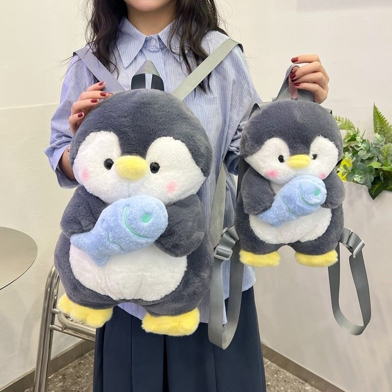 ตุ๊กตาเพนกวินน่ารักสาวตุ๊กตาตุ๊กตากระเป๋าเป้สะพายหลังกระเป๋าการ์ตูนที่ไม่ซ้ํากัน