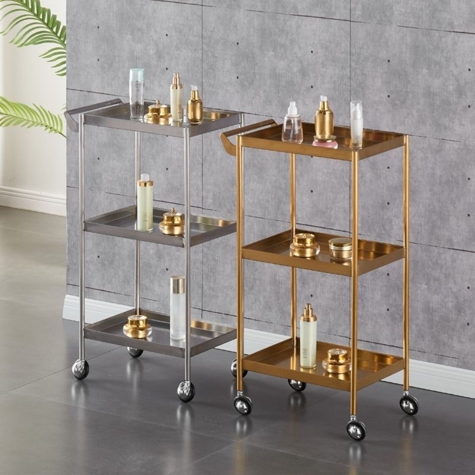 รถเข็นเครื่องมือพับเพื่อความงามและทําผมรถเข็นพับของใช้ในครัวเรือนรถเข็นเก็บของพับสําหรับสินค้าคุณภาพสูงรถเข็นเครื่องมือพับหลายสีน้ําหนักเบ - รูปที่ 7