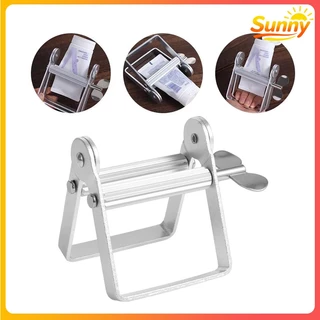 Sunny🌈เครื่องบีบยาสีฟัน เครื่องบีบหลอดกลิ้ง เครื่องมือบีบฝ้า จ่ายฟันเงินอลูมิเนียมขี้เกียจ ซองครีม ที่รีดหลอดเเชมพู