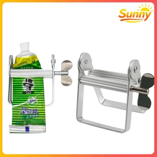 Sunny🌈เครื่องบีบยาสีฟัน เครื่องบีบหลอดกลิ้ง เครื่องมือบีบฝ้า จ่ายฟันเงินอลูมิเนียมขี้เกียจ ซองครีม ที่รีดหลอดเเชมพู
