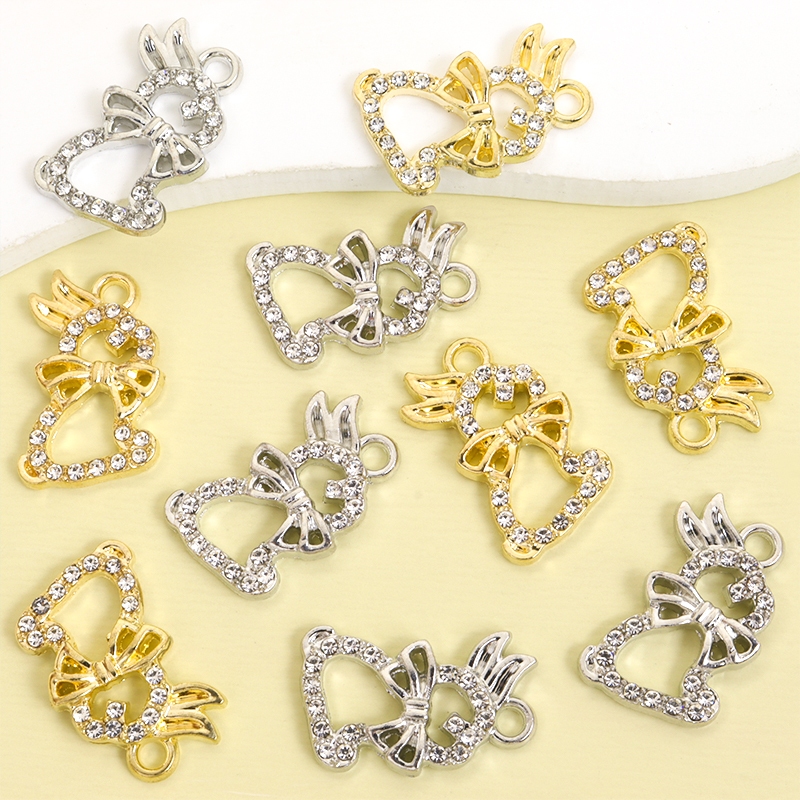 10ชิ้นเงา พลอยเทียม ฝังโบว์ผูกกระต่ายเสน่ห์อารมณ์ที่เรียบง่ายคู่เครื่องประดับกระดูกไหปลาร้าโซ่สร้อยคอสร้อยข้อมือต่างหูพวงกุญแจทําเองน่ารักกลวงกระต่ายจัดแต่งทรงผมโลหะผสมจี้