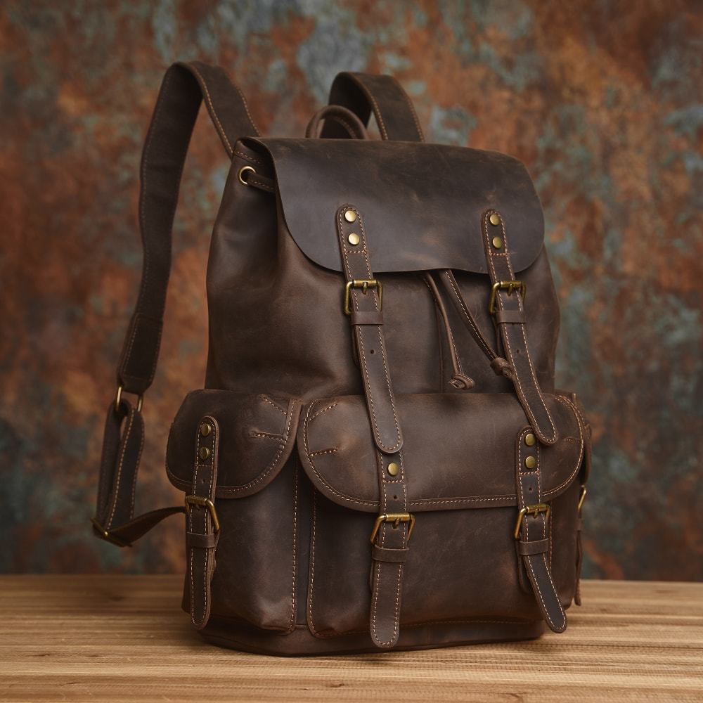 กระเป๋าเป้สะพายหลังหนังแท้ย้อนยุคกระเป๋าหูรูดแฮนด์เมดสามารถถือแล็ปท็อปขนาด 15 นิ้วกระเป๋าเป้สะพายหลังหนังวัวชั้นแรก