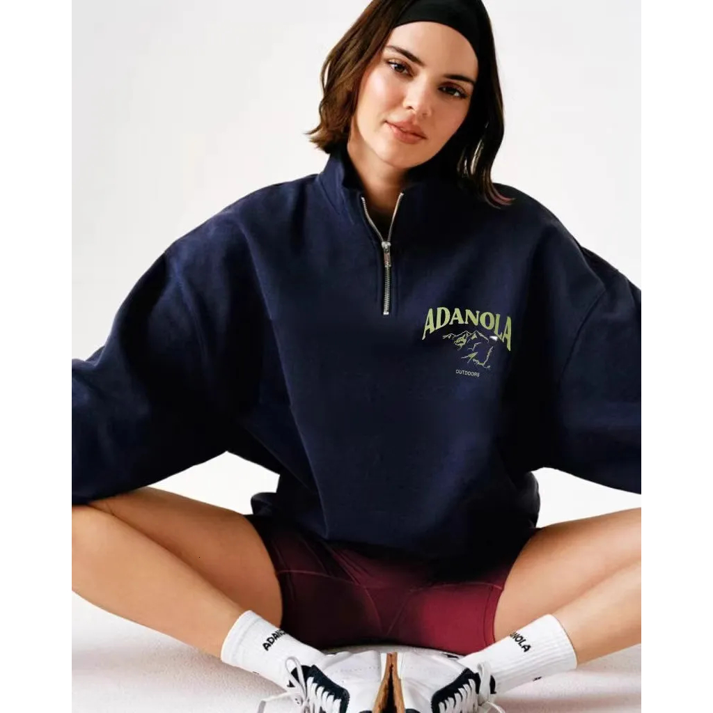 เสื้อสเวตเตอร์ซิปครึ่ง สไตล์กีฬาระดับกลางแจ้ง สีน้ำเงินเข้ม.Size XS | Adanola