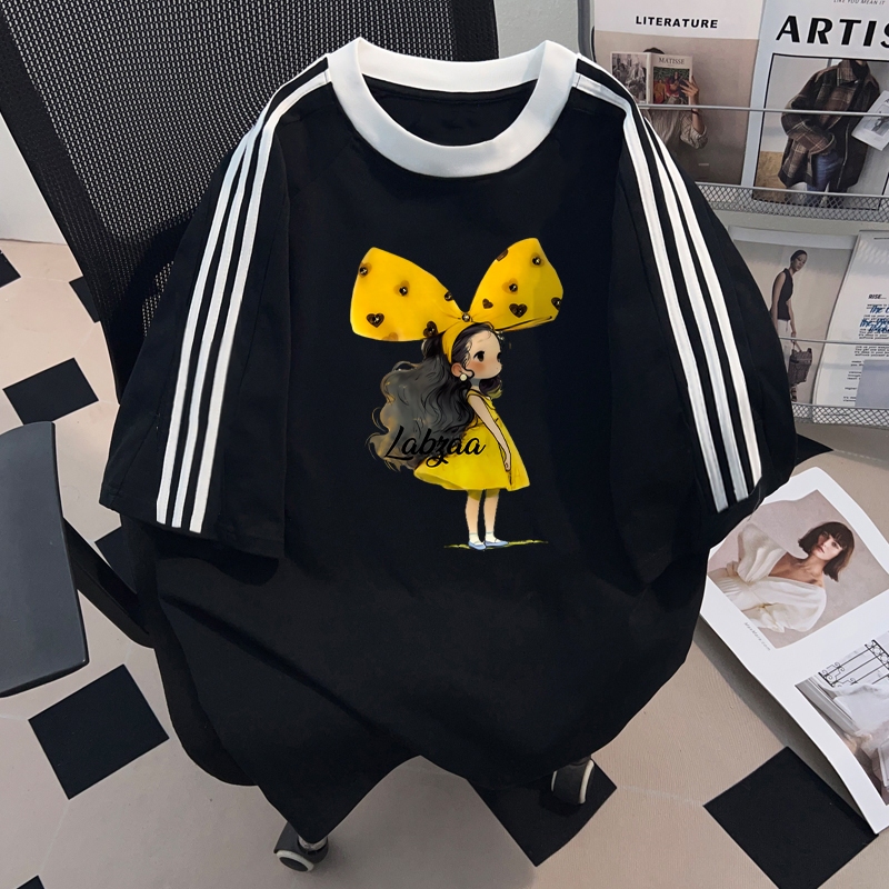 แฟชั่นสไตล์เกาหลี เสื้อยืดฤดูร้อนผู้หญิง ลายเด็กผู้หญิงโบว์สีเหลือง คอกลม ขนาดโอเวอร์ไซซ์ ผ้าคอตตอนรุ่นYG345