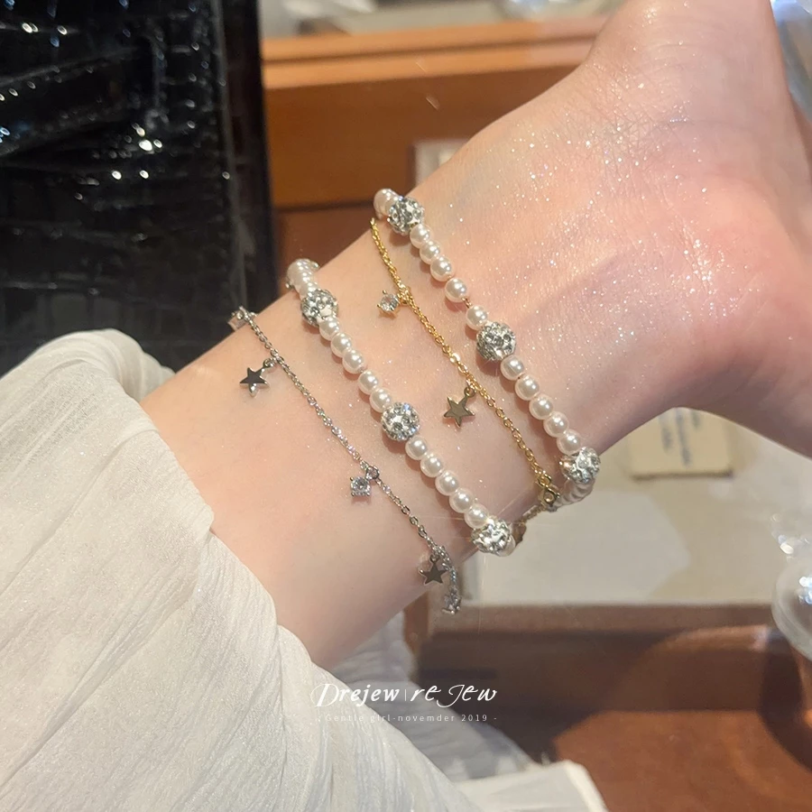 สร้อยข้อมือแฟชั่นวินเทจสำหรับผู้หญิง พลอยเทียมและดาวมุกหลายชั้น