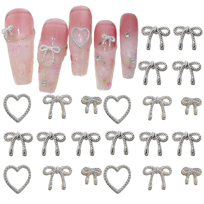 UR SUGAR 10pcs โลหะผสม Bowknot Love เล็บ Art Charms ตกแต่ง 3D โลหะหรูหรา Silver Bows รูป Jewellery DIY เล็บออกแบบอุปกรณ์
