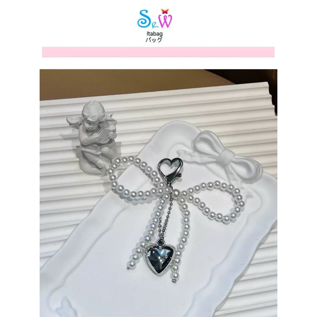 [พร้อมส่งสินค้า] Se.W ลดกระหน่ํา สไตล์เกาหลี อิน ใหม่สาวหวานมุกโบว์เงินจี้หัวใจพวงกุญแจหูฟังบลูทูธแขวนเครื่องประดับ