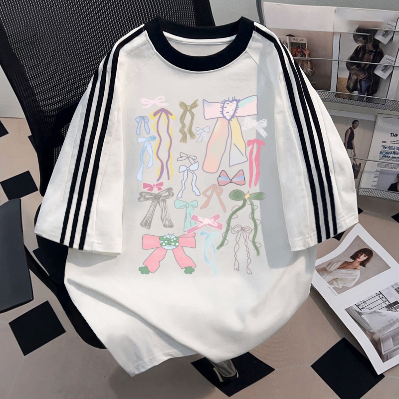 NFVใ หม่ล่าสุด🎀ลายพิมพ์โบว์สีชมพู เสื้อยืดผู้หญิงoversized ผ้าฝ้ายแท้ ระบายอากาศ