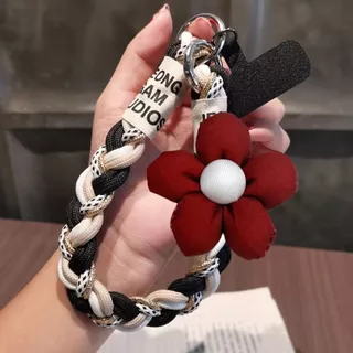 ดอกไม้สไตล์คริสต์มาสถักเชือกเส้นเล็กโทรศัพท์มือถือสีแดงปีใหม่ข้อมือสไตล์สั้นแข็งแรงทนทานกลางแจ้งแบบพกพาเชือกสาวของขวัญ