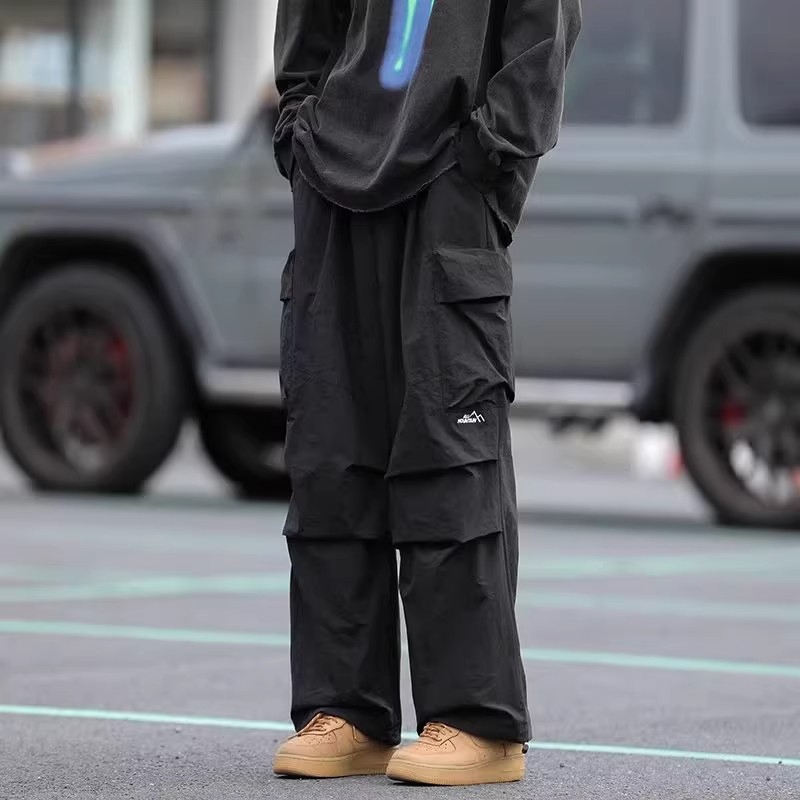 กางเกงคาร์โก้   ผู้ชาย กางเกงทรงหลวม กางเกงสีดํา มีกระเป๋า 4 ใบ เอวยางยืด ทรงหลวม ขากางเกงปรับได้  เหมาะสำหรับโอกาสต่างๆ พร้อมส่ง🚚⚡ - รูปที่ 4