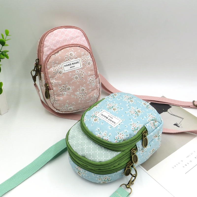 กระเป๋าเป้สะพายข้างสำหรับผู้หญิง แบบหลายชั้น ทำจากผ้าใบnylon มีช่องเก็บphone compartment