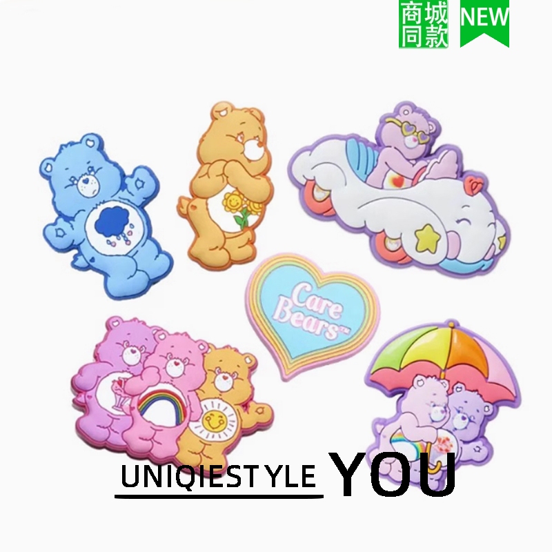 2026 รองเท้ารูจระเข้สไตล์ใหม่ Huazhibixing อุปกรณ์เสริมน่ารักการ์ตูน Care Bear ชุดห้าชิ้นสไตล์ใหม่ Care Bear ร่ม