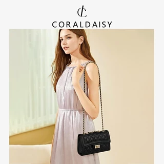 CORALDAISY 2025 รูปแบบใหม่ ห่วงโซ่ที่หรูหรา กระเป๋าสะพายข้าง หัวเข็มขัดหมุน แฟชั่นสีทึบ กระเป๋าสะพาย