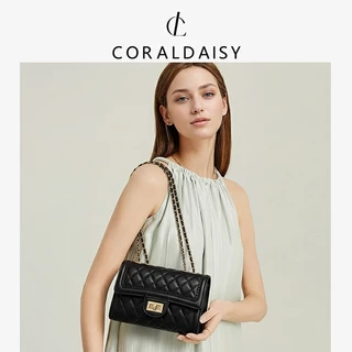 CORALDAISY 2025 รูปแบบใหม่ ห่วงโซ่ที่หรูหรา กระเป๋าสะพายข้าง หัวเข็มขัดหมุน แฟชั่นสีทึบ กระเป๋าสะพาย