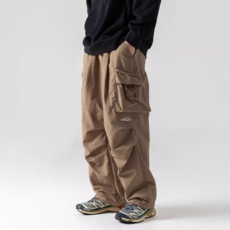 กางเกงคาร์โก้   ผู้ชาย กางเกงทรงหลวม กางเกงสีดํา มีกระเป๋า 4 ใบ เอวยางยืด ทรงหลวม ขากางเกงปรับได้  เหมาะสำหรับโอกาสต่างๆ พร้อมส่ง🚚⚡ - รูปที่ 3