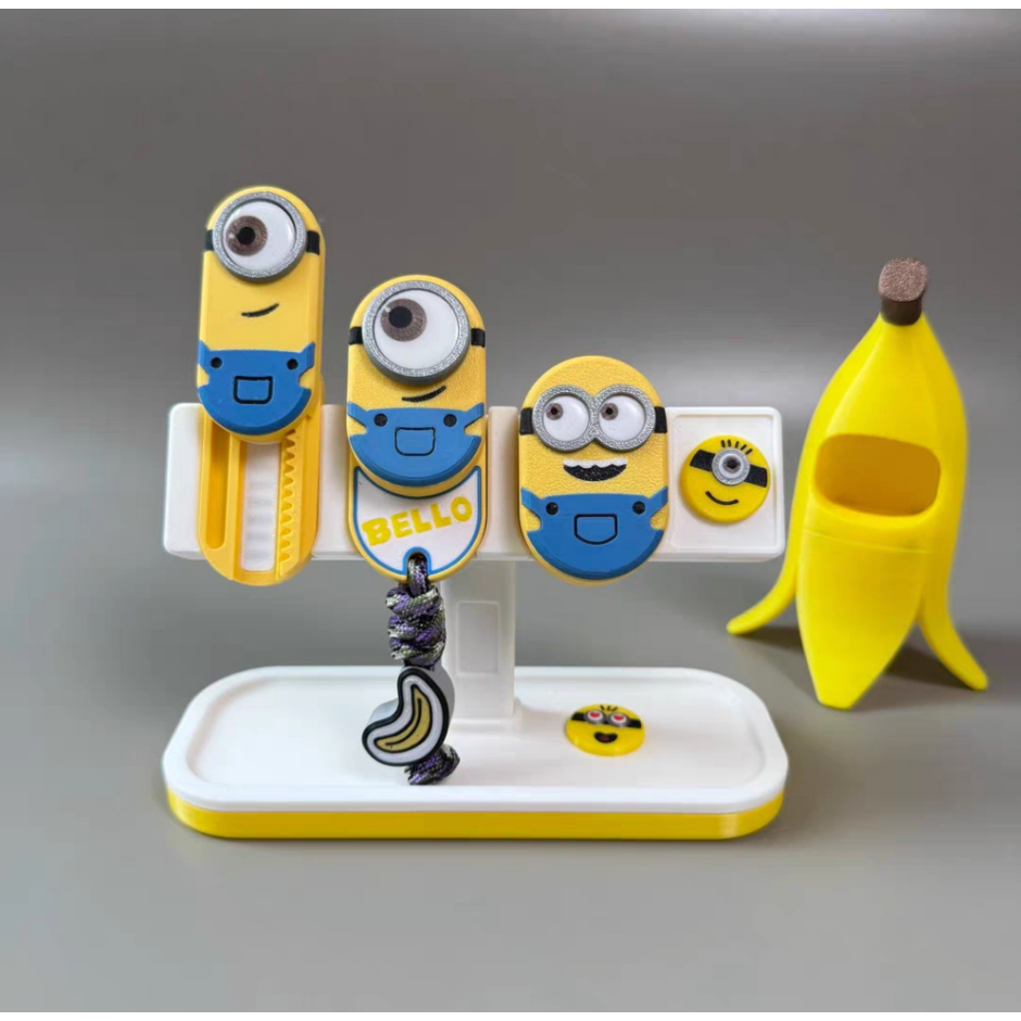 3D การพิมพ์ Minions Big Eyes น่ารัก Rhythm Magnetic Ding Ding Push Card Decompression ของเล่น edc