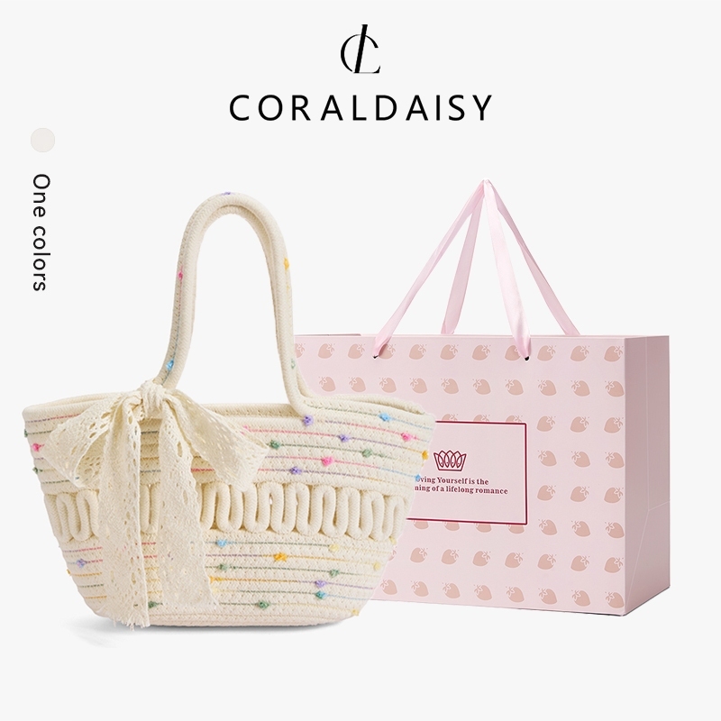 CORALDAISY 2026 รุ่นใหม่ปี กระเป๋าผู้หญิง กระเป๋าถือที่หรูหรา ลายจุดสีสันสดใสน่ารัก กระเป๋าสานริบบิ้