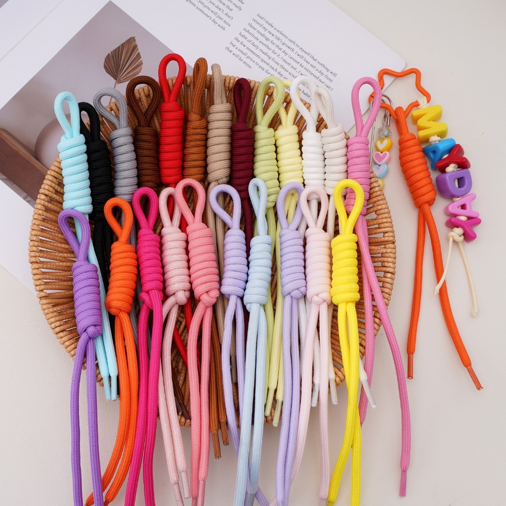 1ชิ้นโรมันปมเชือกร่ม ทําเอง กระเป๋าเป้สะพายหลังเสน่ห์พวงกุญแจ