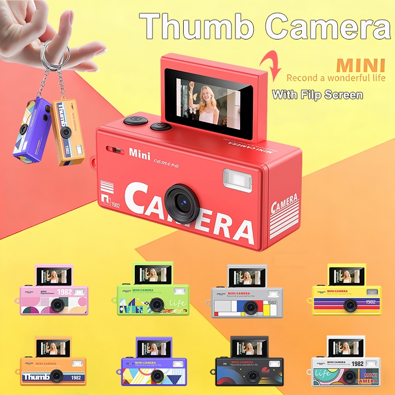 มินิพวงกุญแจกล้องดิจิตอลกล้องวิดีโอนิ้วหัวแม่มือย้อนยุคที่มี0.96'' ความละเอียดสูง พลิกหน้าจอในตัวแฟลชกรองของขวัญในอุดมคติสําหรับเด็กนักเรียนเริ่มต้น