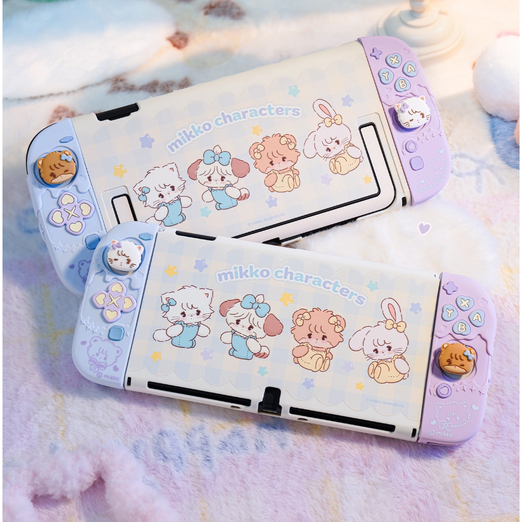 GeekShare เคสป้องกันสําหรับ Switch/OLED,เคสฝาครอบบางเข้ากันได้กับสวิตช์/OLED,เคสป้องกันซิลิโคนอ่อนนุ่มแบบแยกสําหรับคอนโซลเกมพร้อมหมวกจับนิ้วหัวแม่มือ 2 อัน- Mikko Sweet