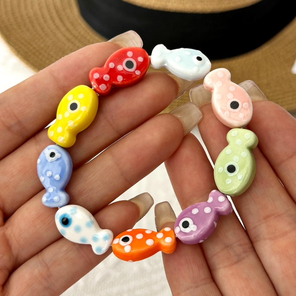 สร้อยข้อมือแฮนด์เมดเซรามิกแบบสีสันสดใส ออกแบบเป็นภาพปีศาจตาและปลา สำหรับผู้หญิง เป็นของขวัญวันหยุดที่สวยงาม
