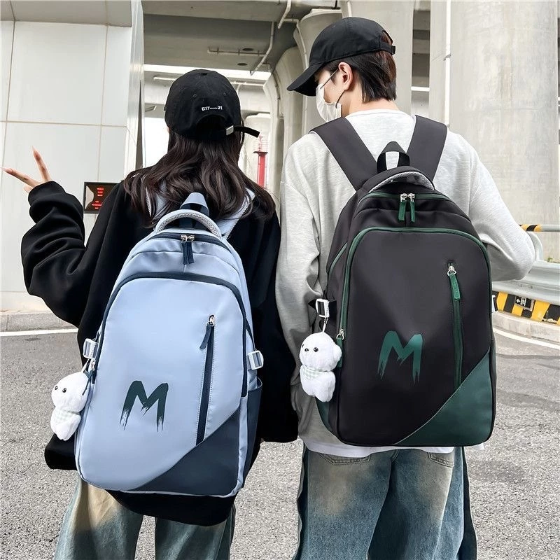 กระเป๋าหลัง เป้สะพายหลังกันน้ำ ความจุสูง สีชนกัน แฟชั่น unisex สำหรับนักเรียนมัธยม นักศึกษา ชาย-หญิง back to school