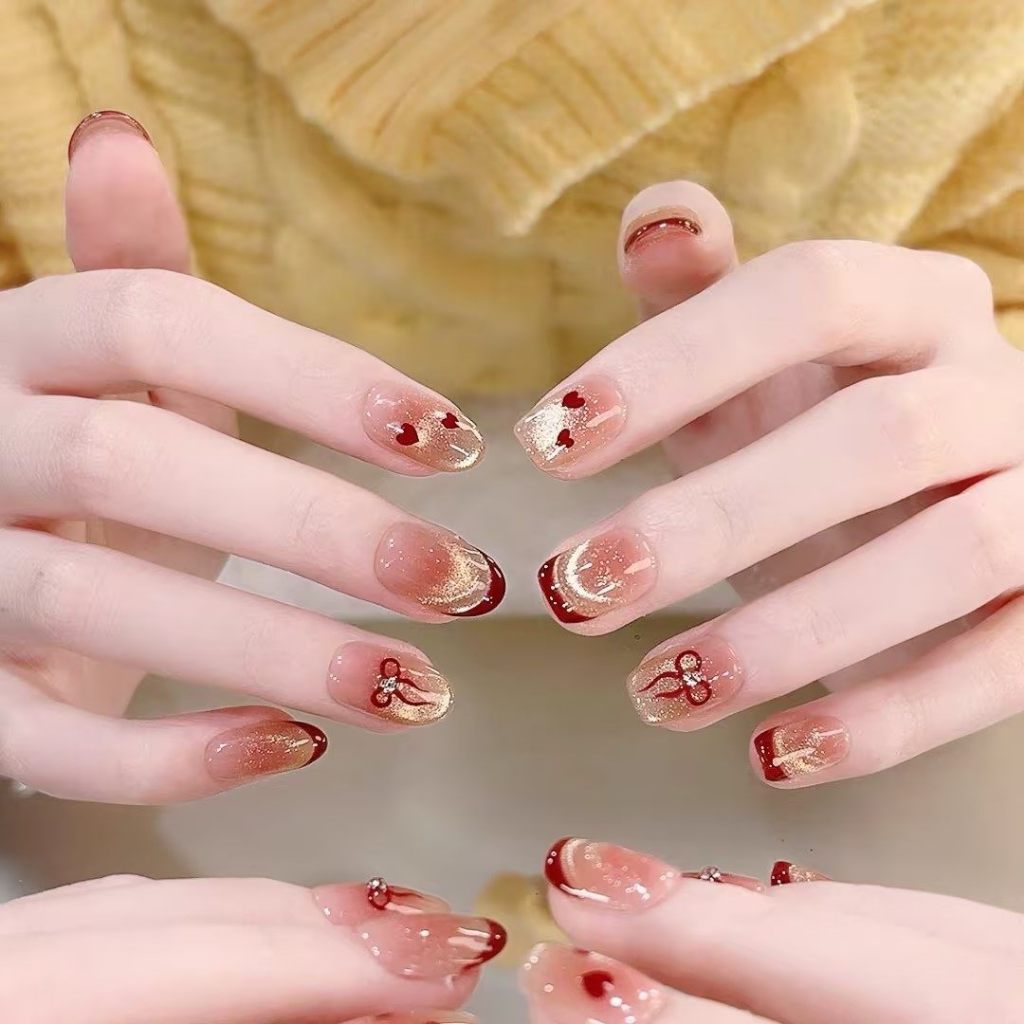 T045 เล็บปลอมสําเร็จรูป ทำด้วยมือ 10 ชิ้น/กล่อง หัวใจสีแดงฝรั่งเศส หวาน ๆ น่ารัก สวมง่าย ใช้ซ้ำได้