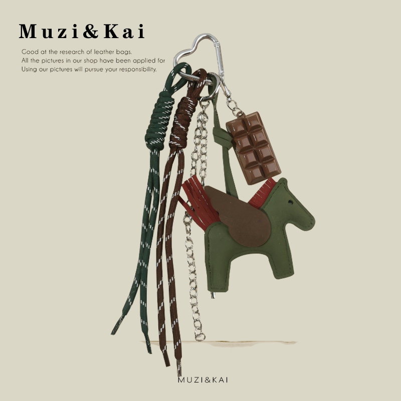 Muzikai จี้ 2026 สไตล์ใหม่ Flocking Pony กระเป๋าจี้แฟชั่น All-Match Pony กระเป๋า PU อุปกรณ์เสริมจี้