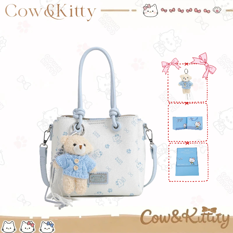 กระเป๋าถือสีน้ำเงิน พร้อมชาร์มหมี สำหรับผู้หญิง และสามารถเป็นกระเป๋าสะพายข้างได้